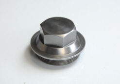 Cap for magneto pinion